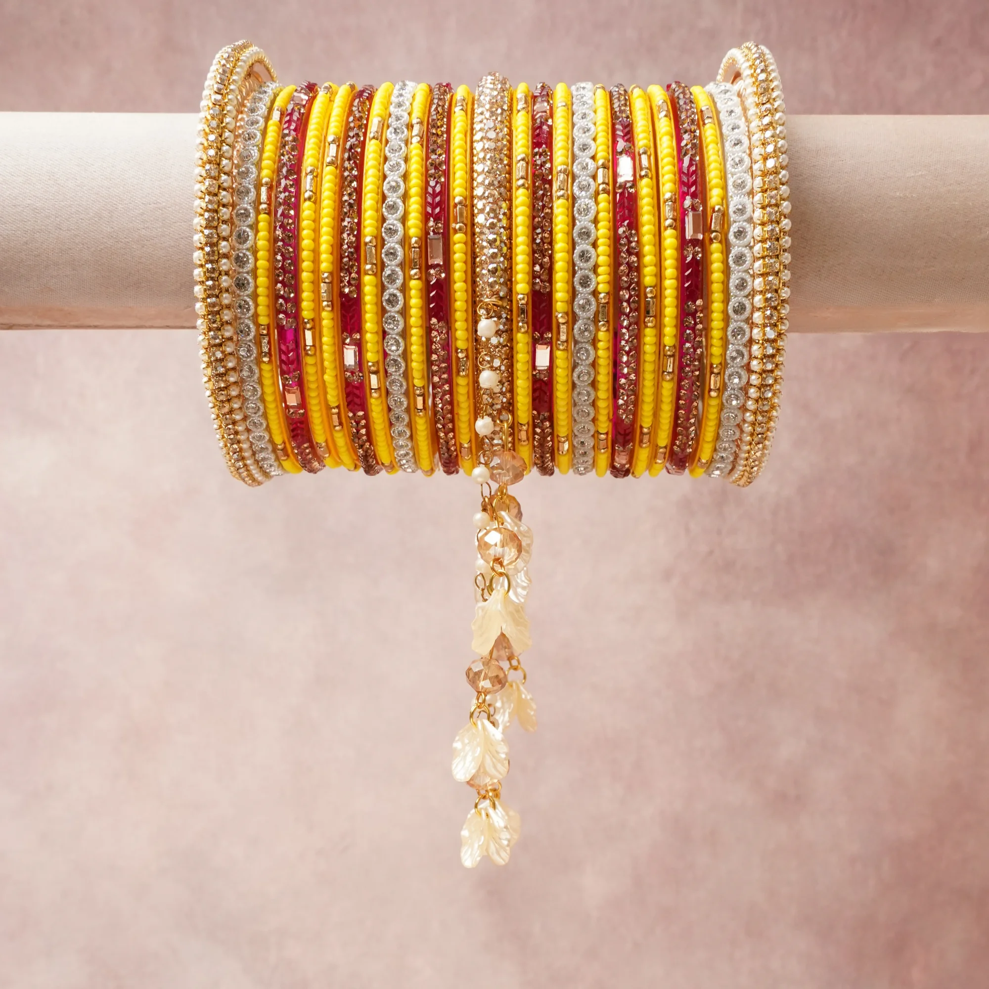 A commanding Vivid Yellow anchors this beautiful set, enriched with accents of Deep Red, Metallic Gold, Metallic Silver, Clear, Cream that add depth and dimension.

Featuring a striking composition of Resin, Plated Metal, Seed Beads, Rhinestones, Faux Pearls, Natural Shell, this set carries intricate craftsmanship and strong presence. Grand in form, it is created for moments that deserve to be marked.